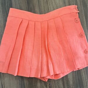 Coral Pleated Skirt with Button Detail